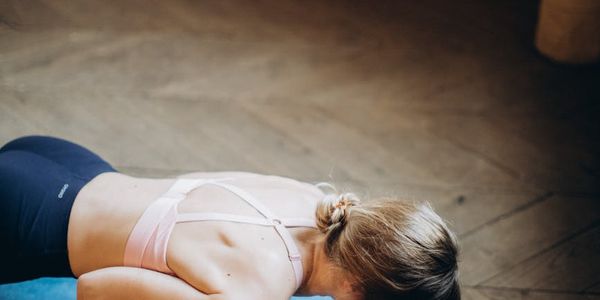 A spacious, calm room prepared for a workout session.